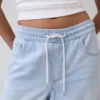 Jeans baggy morbidi a vita media
