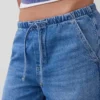 Jeans baggy morbidi a vita media