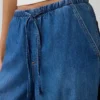 Jeans baggy morbidi a vita media