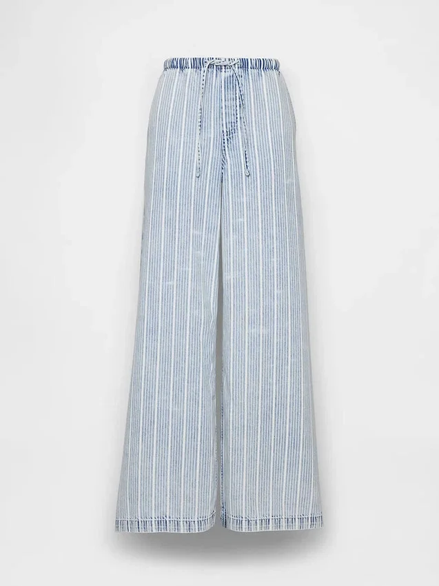 Jeans baggy morbidi a vita media