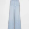 Jeans baggy morbidi a vita media