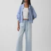 Jeans cropped a vita bassa, dal taglio ampio e disinvolto in stile anni ’90
