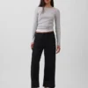 Jeans cropped a vita bassa, morbidissimi e dal taglio ampio in stile anni ’90