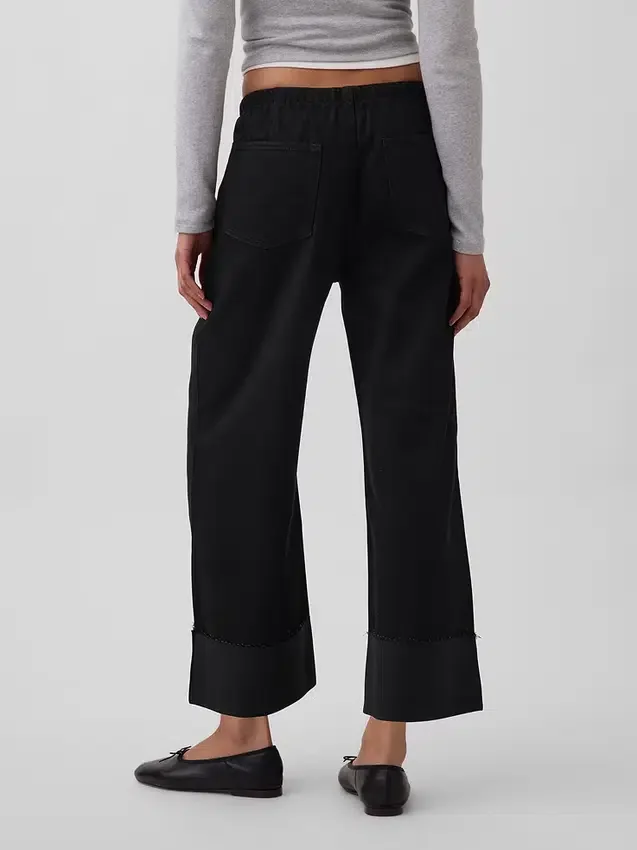 Jeans cropped a vita bassa, morbidissimi e dal taglio ampio in stile anni ’90