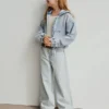Jeans da bambino a vita alta, gamba larga e lunghezza alla caviglia