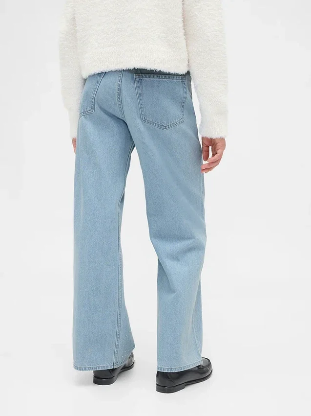 Jeans da bambino a vita bassa, gamba larga e strass