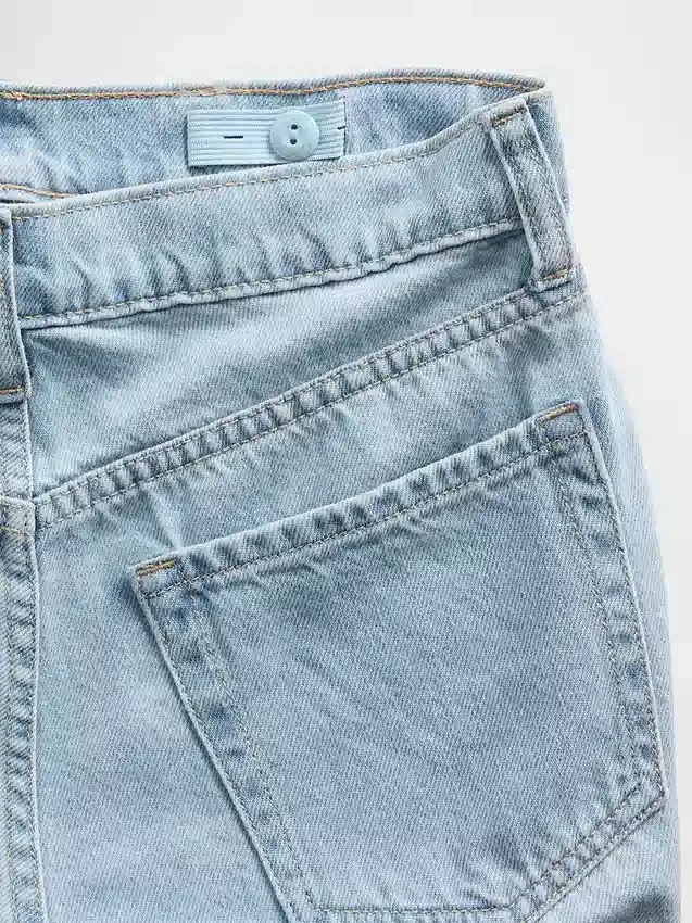 Jeans da bambino a vita bassa, gamba larga e strass