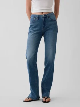 Jeans dritti dal taglio rilassato a vita media con orlo asimmetrico
