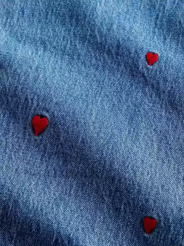 Jeans dritti dal taglio rilassato, con ricami e vita media