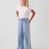 Jeans larghi a vita bassa con bordi in pizzo per bambini