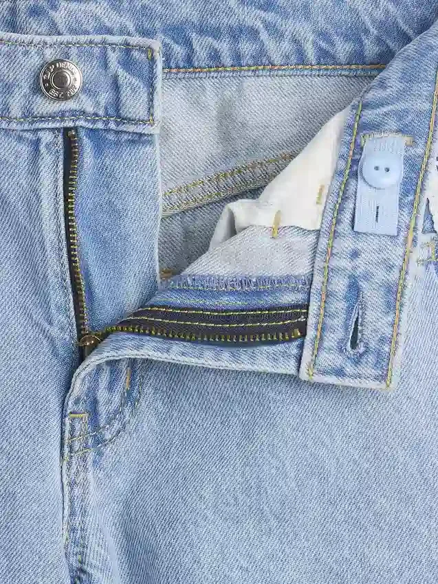 Jeans larghi a vita bassa con bordi in pizzo per bambini