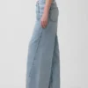 Jeans larghi a vita media con cintura