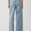 Jeans larghi a vita media con cintura