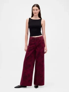 Jeans larghi a vita media con motivo floreale