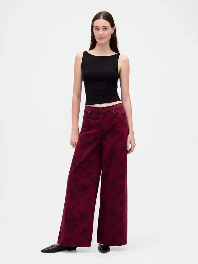 Jeans larghi a vita media con motivo floreale