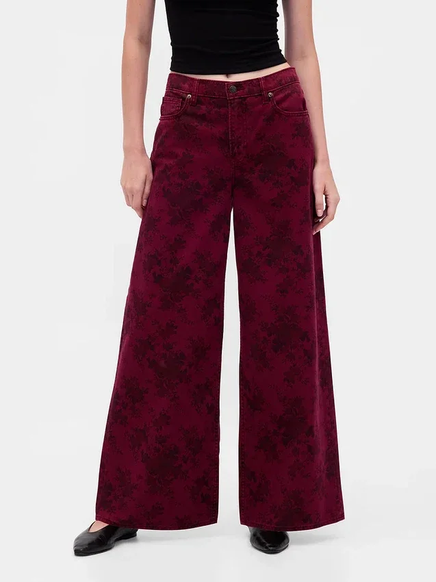 Jeans larghi a vita media con motivo floreale