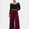 Jeans larghi a vita media con motivo floreale