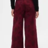 Jeans larghi a vita media con motivo floreale