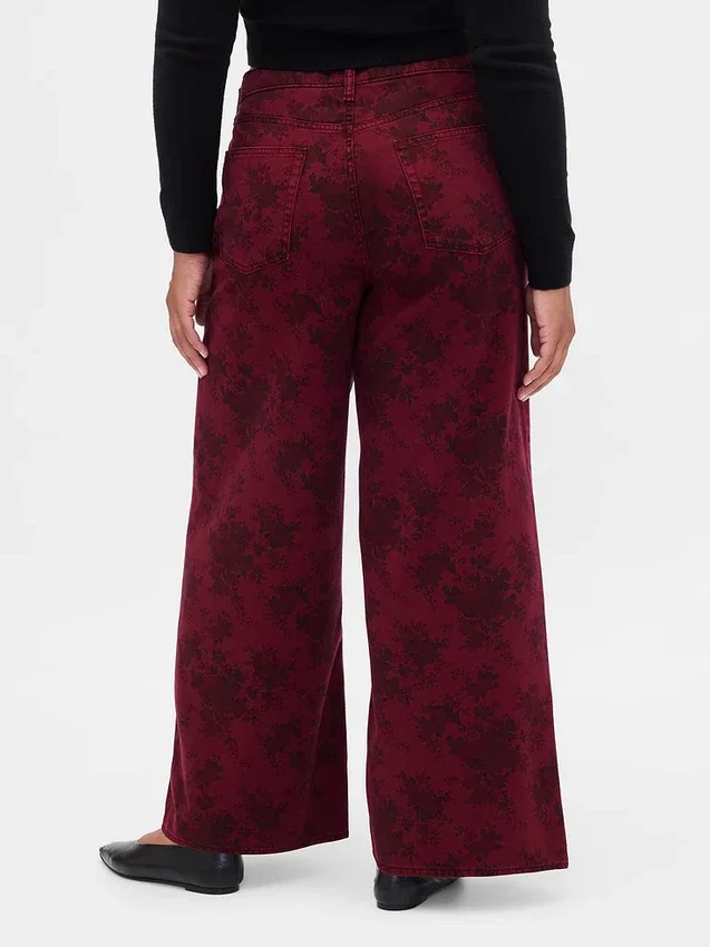 Jeans larghi a vita media con motivo floreale