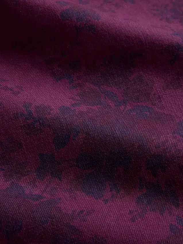 Jeans larghi a vita media con motivo floreale