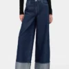 Jeans larghi a vita media con risvolto metallizzato