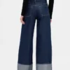 Jeans larghi a vita media con risvolto metallizzato