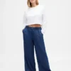 Jeans larghi a vita media, morbidissimi e con pieghe