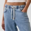 Jeans larghi in maglia a vita media