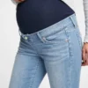 Jeans skinny alla caviglia premaman con vita vera e pannello intero effetto consumato