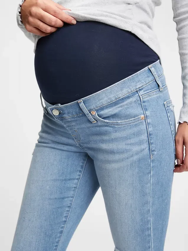 Jeans skinny alla caviglia premaman con vita vera e pannello intero effetto consumato