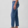 Jeans slim a vita media con gamba affusolata