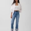 Jeans slim dritti a vita alta con risvolto in stile anni '90