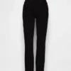 Jeans slim vintage a vita media