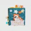 Libro morbido con attività e carta frusciante “Little Rocket Finds Home”