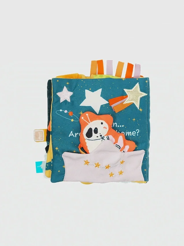 Libro morbido con attività e carta frusciante “Little Rocket Finds Home”