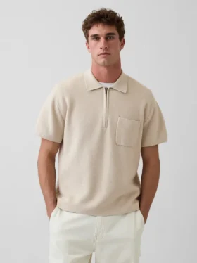 Maglia polo oversize con tasca e zip a un quarto