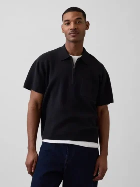 Maglia polo oversize con tasca e zip a un quarto