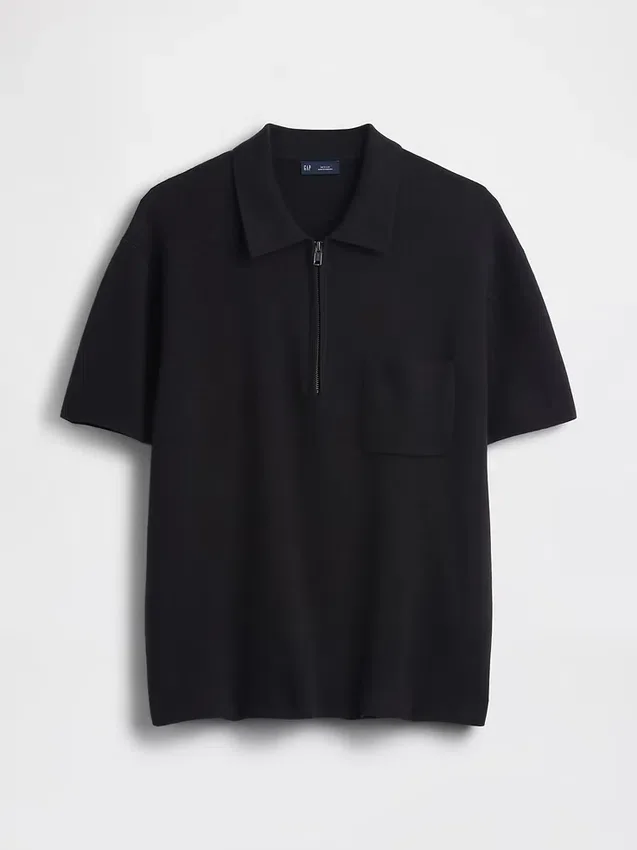Maglia polo oversize con tasca e zip a un quarto