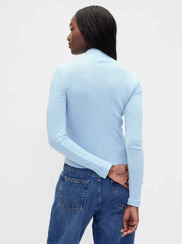 Maglione a collo alto corto a costine pointelle