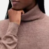 Maglione a collo alto in 100% lana merino