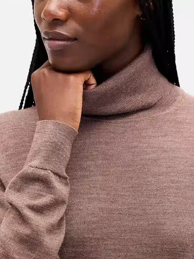 Maglione a collo alto in 100% lana merino