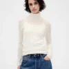 Maglione a collo alto in maglia pointelle