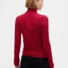 Maglione a collo alto in maglia pointelle