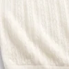 Maglione a collo alto in maglia pointelle
