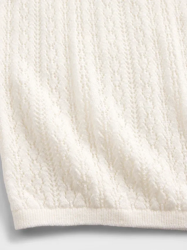 Maglione a collo alto in maglia pointelle