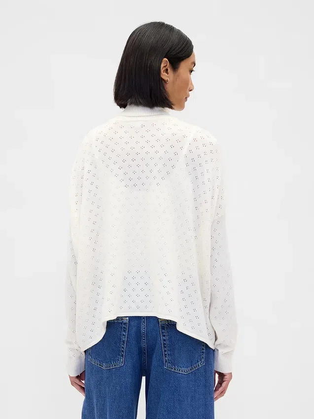 Maglione a collo alto oversize in punto pointelle