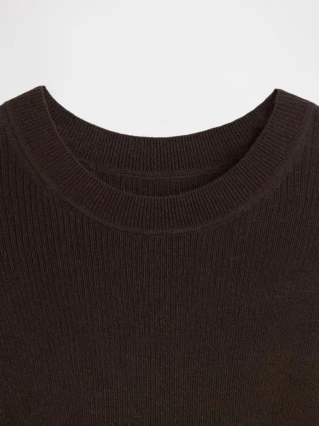 Maglione a coste trasparente