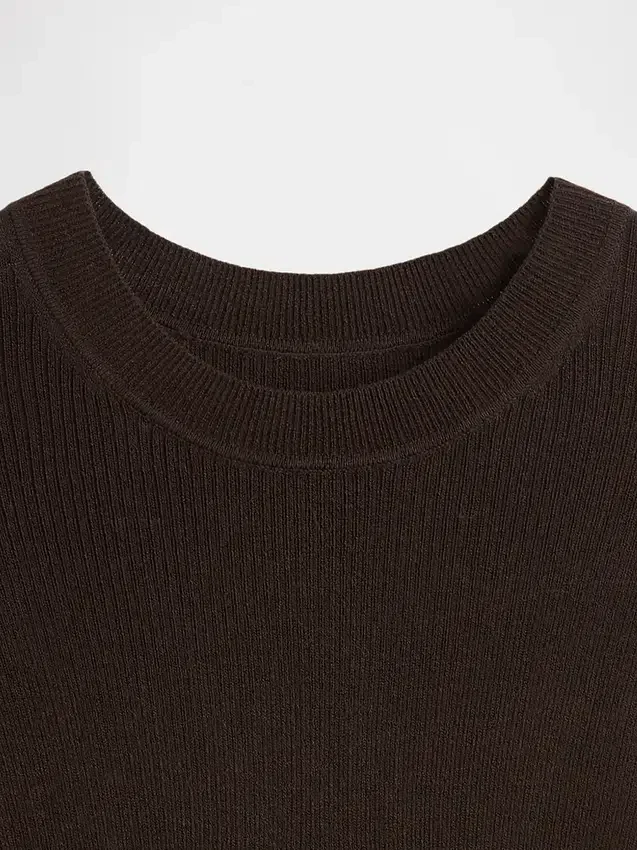 Maglione a coste trasparente