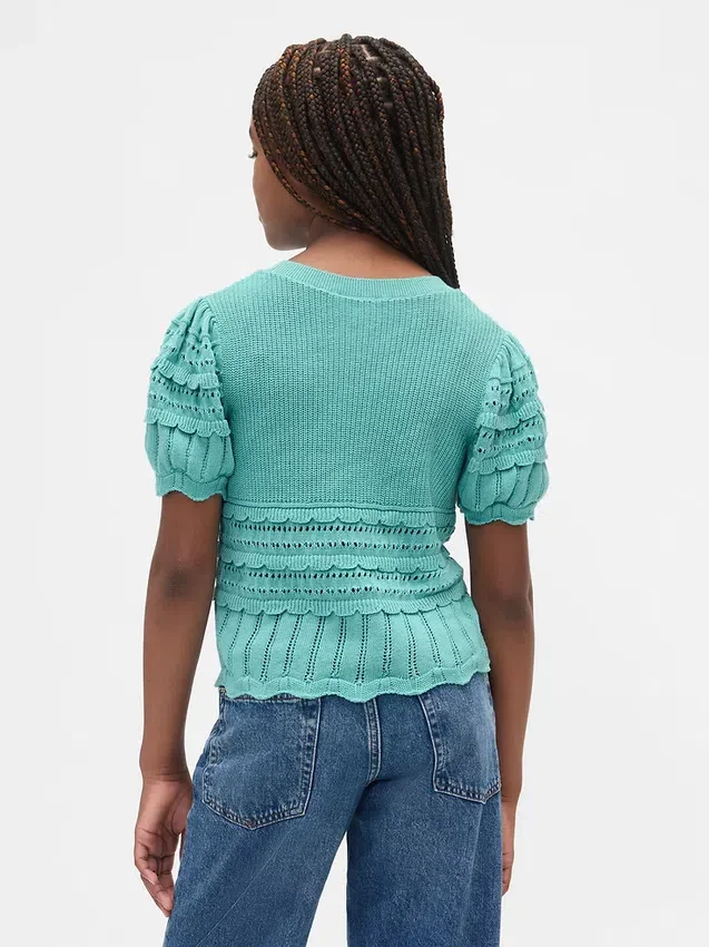 Maglione da bambino con bordi smerlati e punti misti