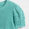 Maglione da bambino con bordi smerlati e punti misti